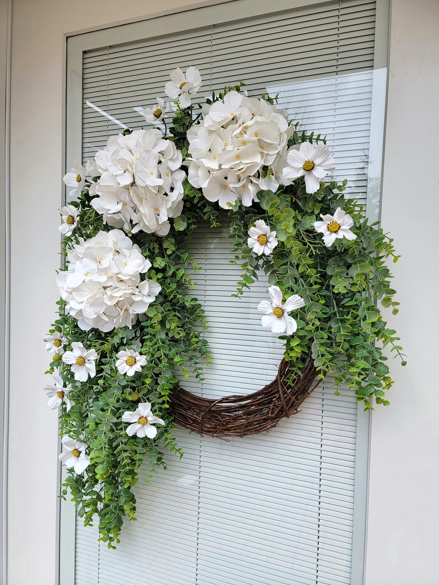 White Hydrangea, Cosmo and Eucalyptus Grapevine Wreath